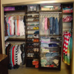 Reach-in Closet in Brown Pearwood with Chrome Baskets
